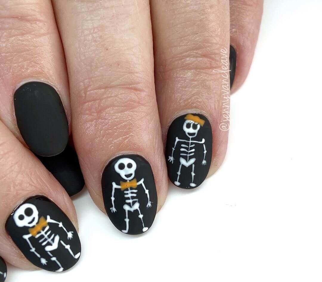 design des ongles de squelette pour halloween