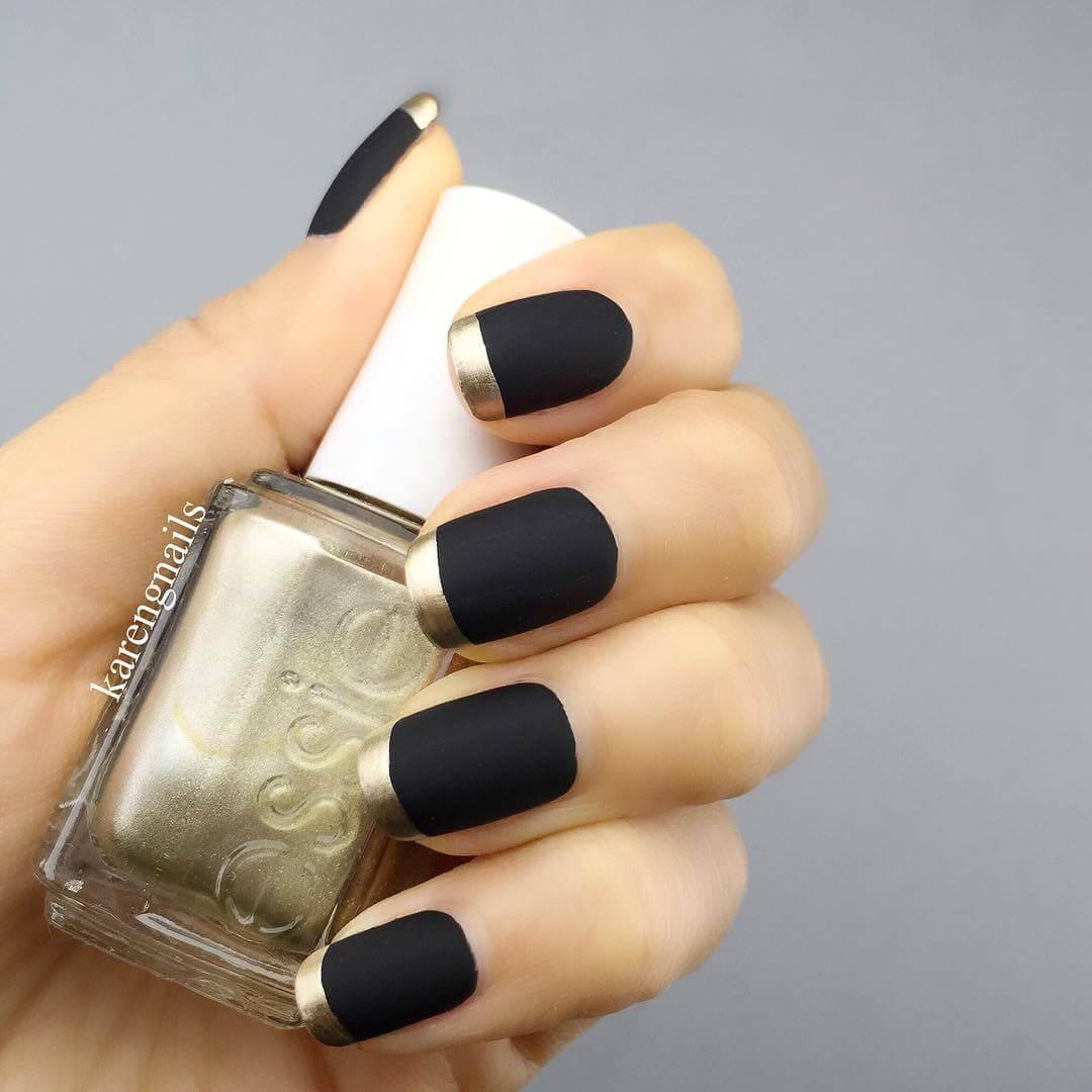 Ongles français noirs et or